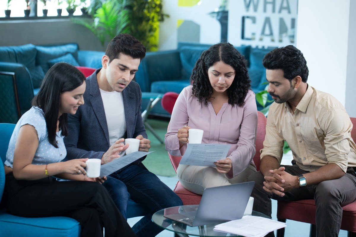 A Policy Nivesh advisor on a call with a client