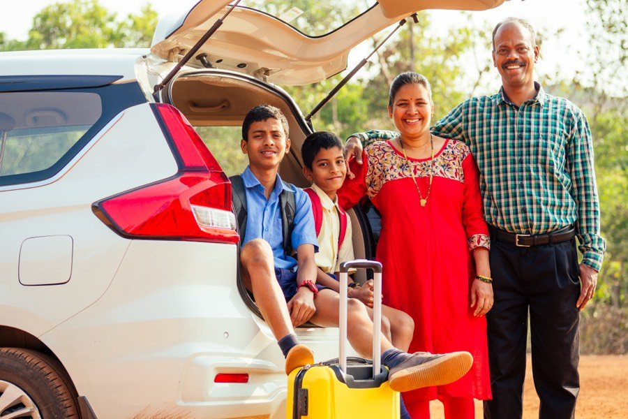 An Indian family setting off on a holiday